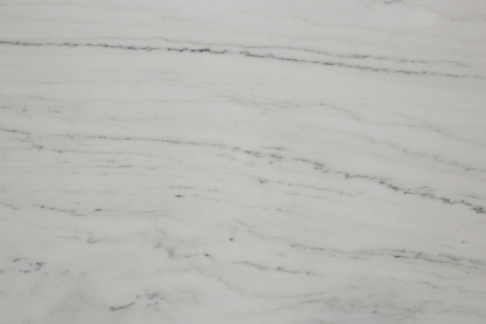 Olympian White Select vein-cut marble slab with linear gray veining