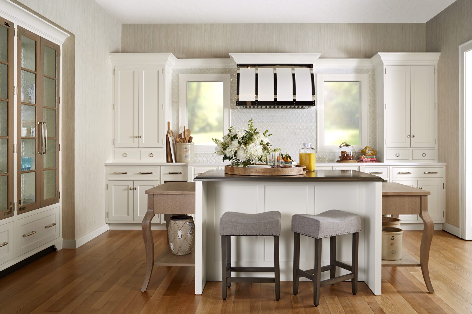 Plato Custom Shop kitchen, white inset cabinetry with custom strap-detail hood and glass-front hutch