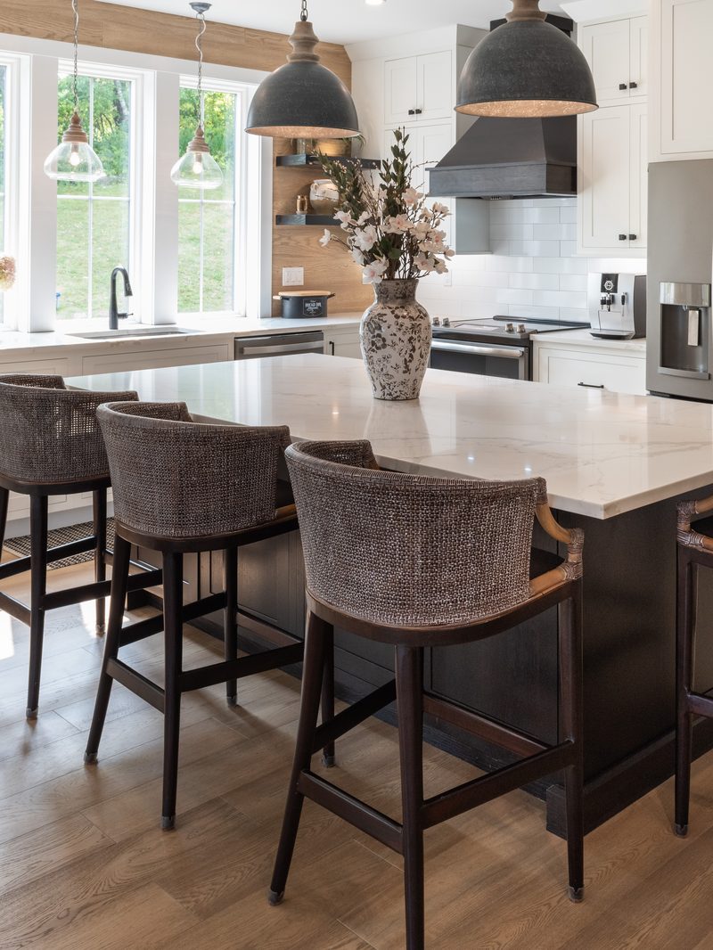 Farmhouse kitchen island and white oak accent wall from a Triumph whole-home project