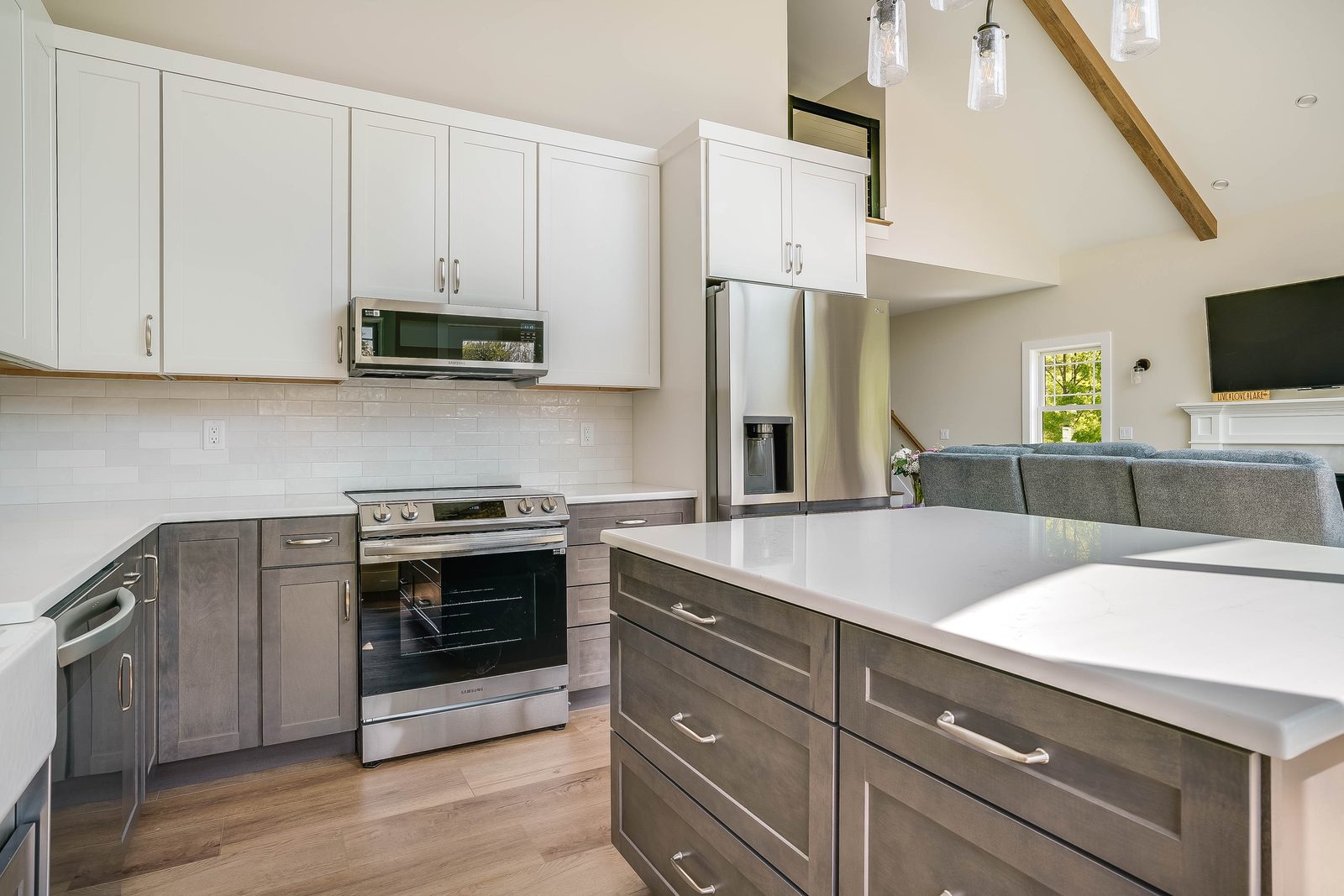 Colt-stained island and range wall with white uppers