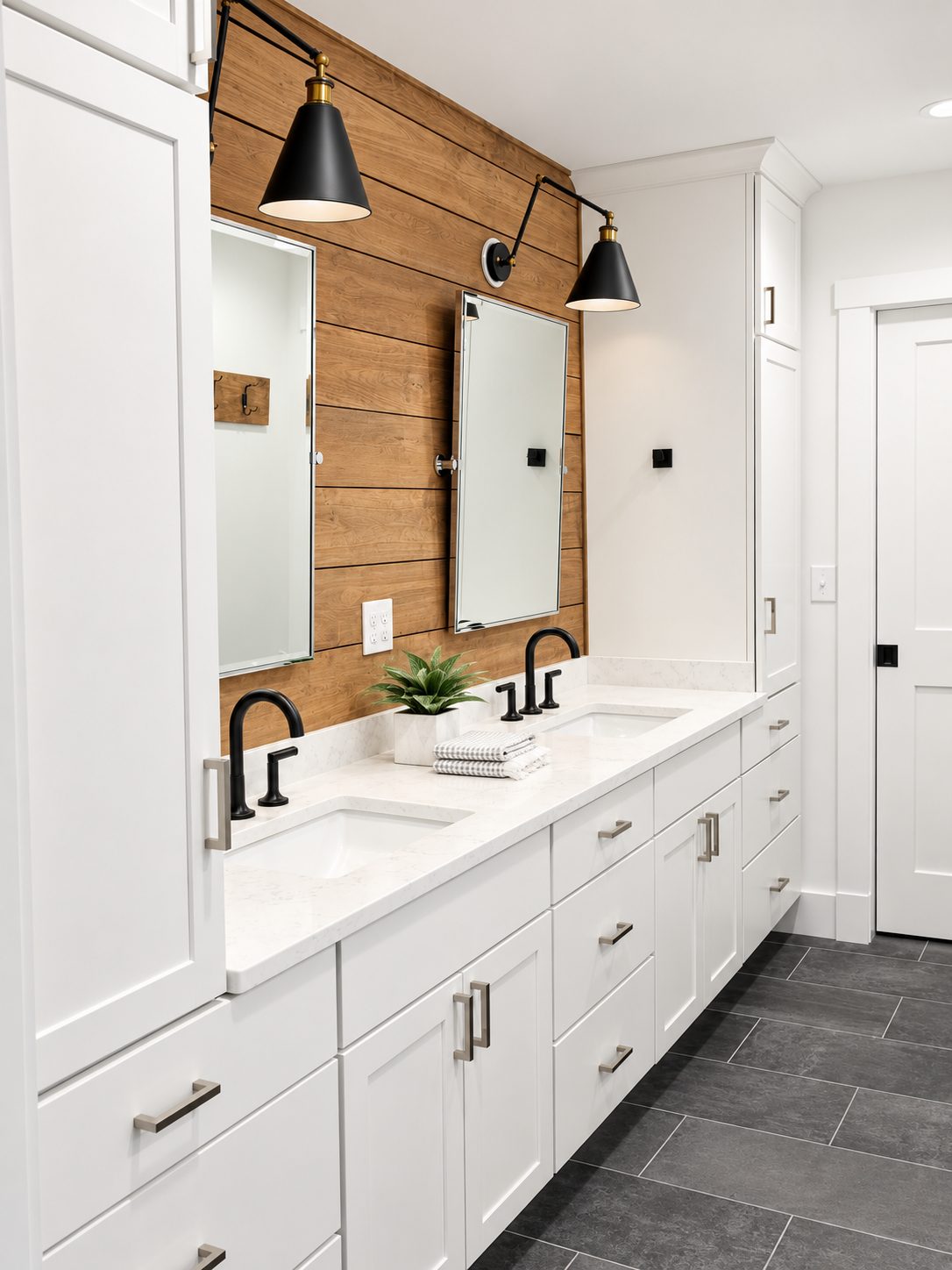 Long white vanity run with black hardware