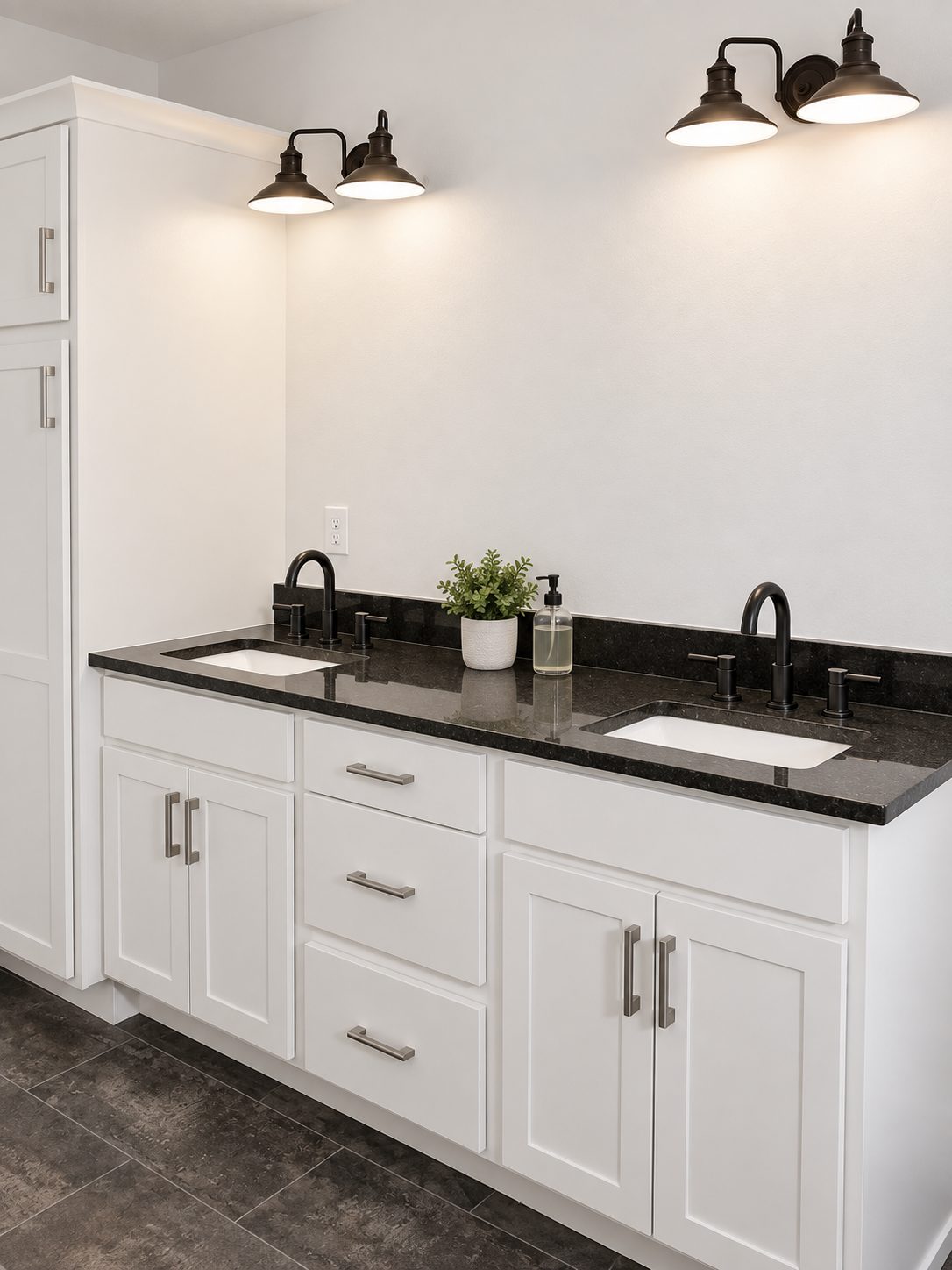 White double vanity with black quartz top