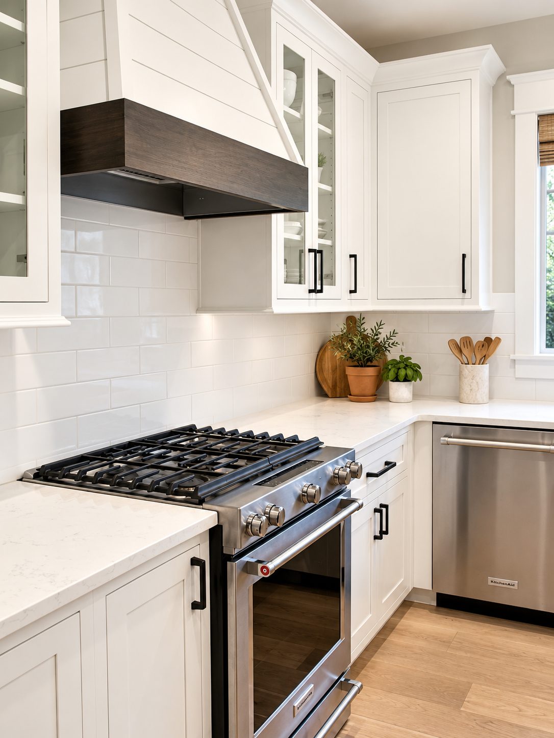 Shiplap hood over the range with white subway tile