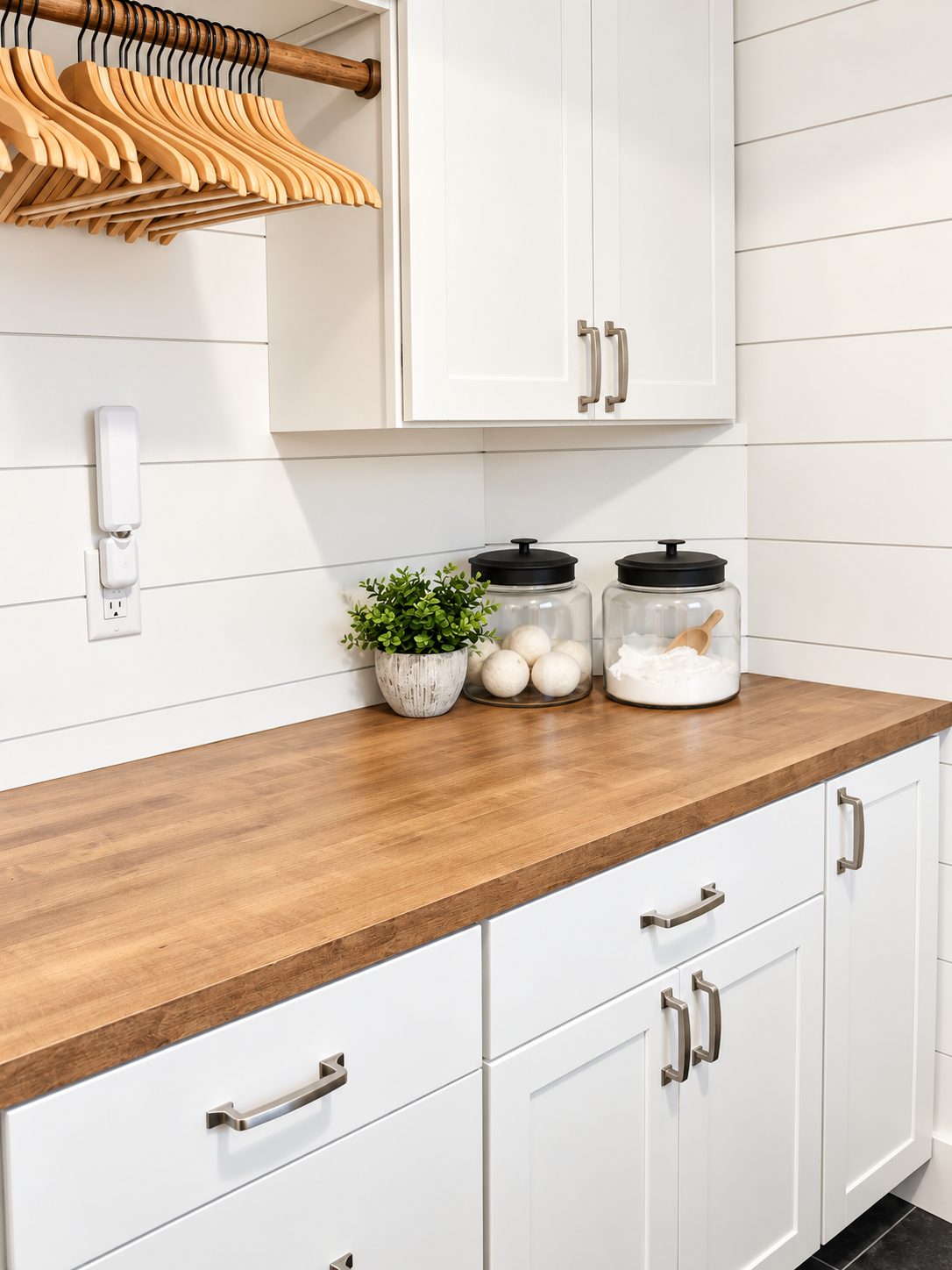 Laundry with butcher block top and hanging rod