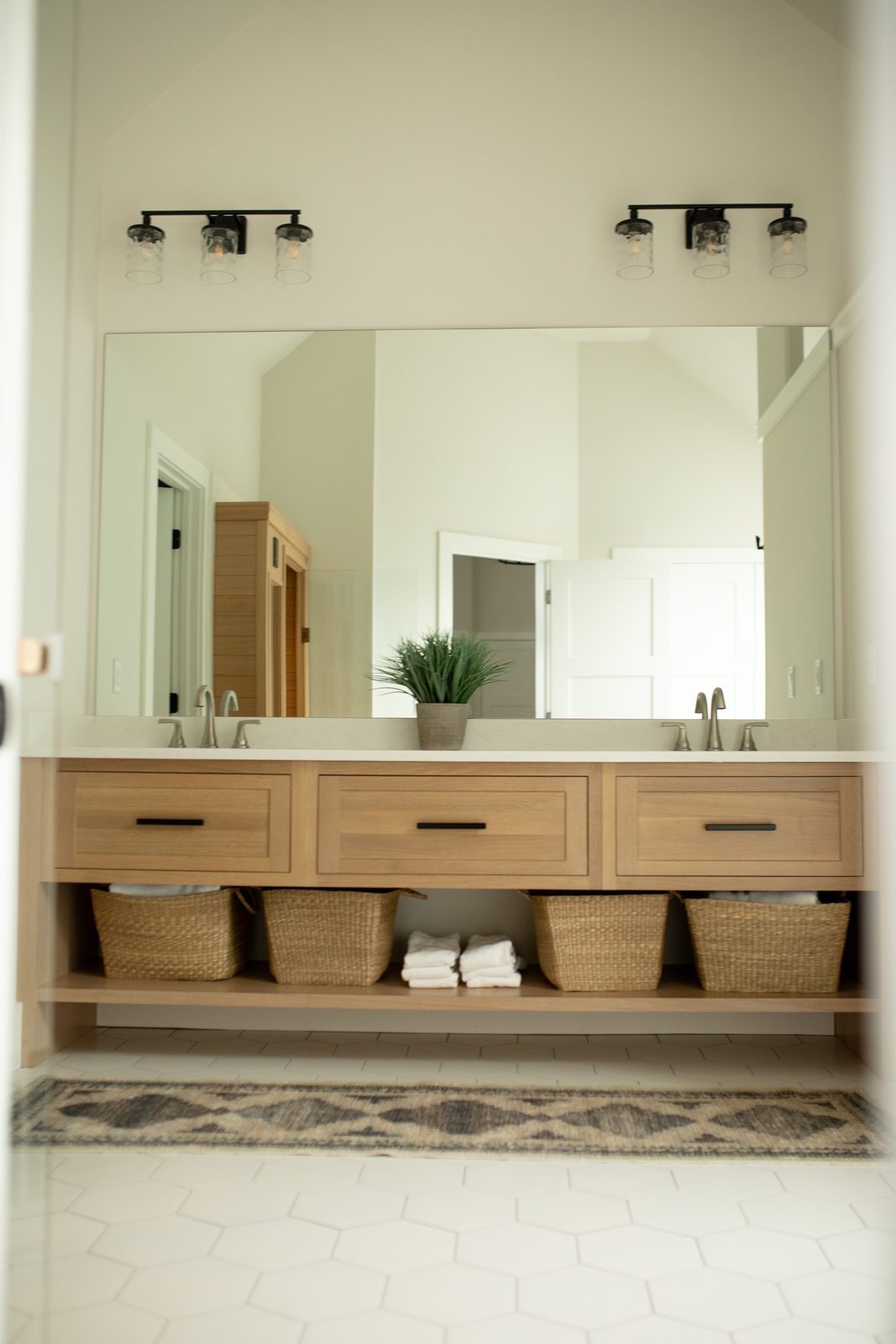 Oak floating double vanity with baskets