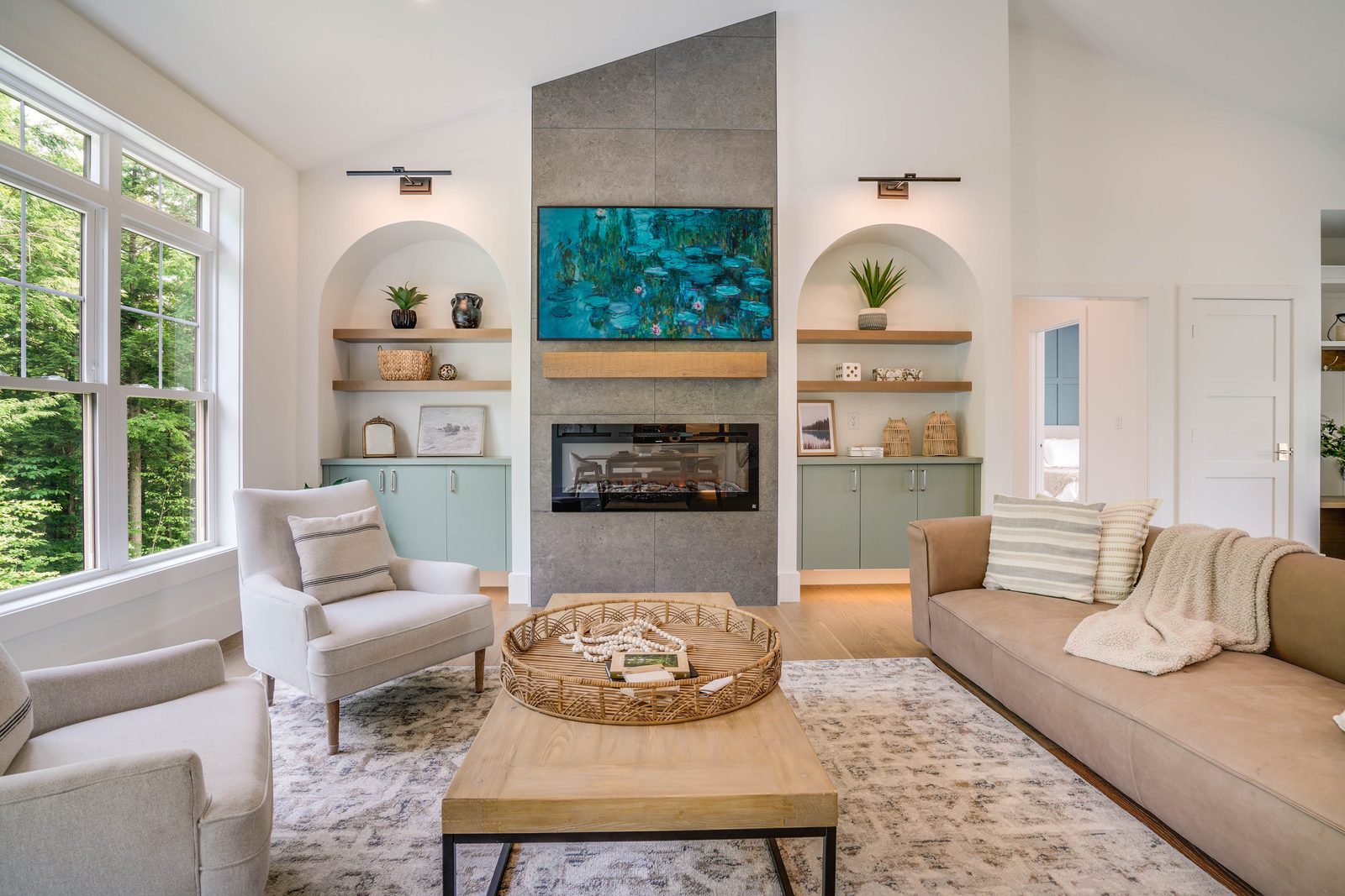 Fireplace wall in Verde Salvia with arched niches and floating shelves