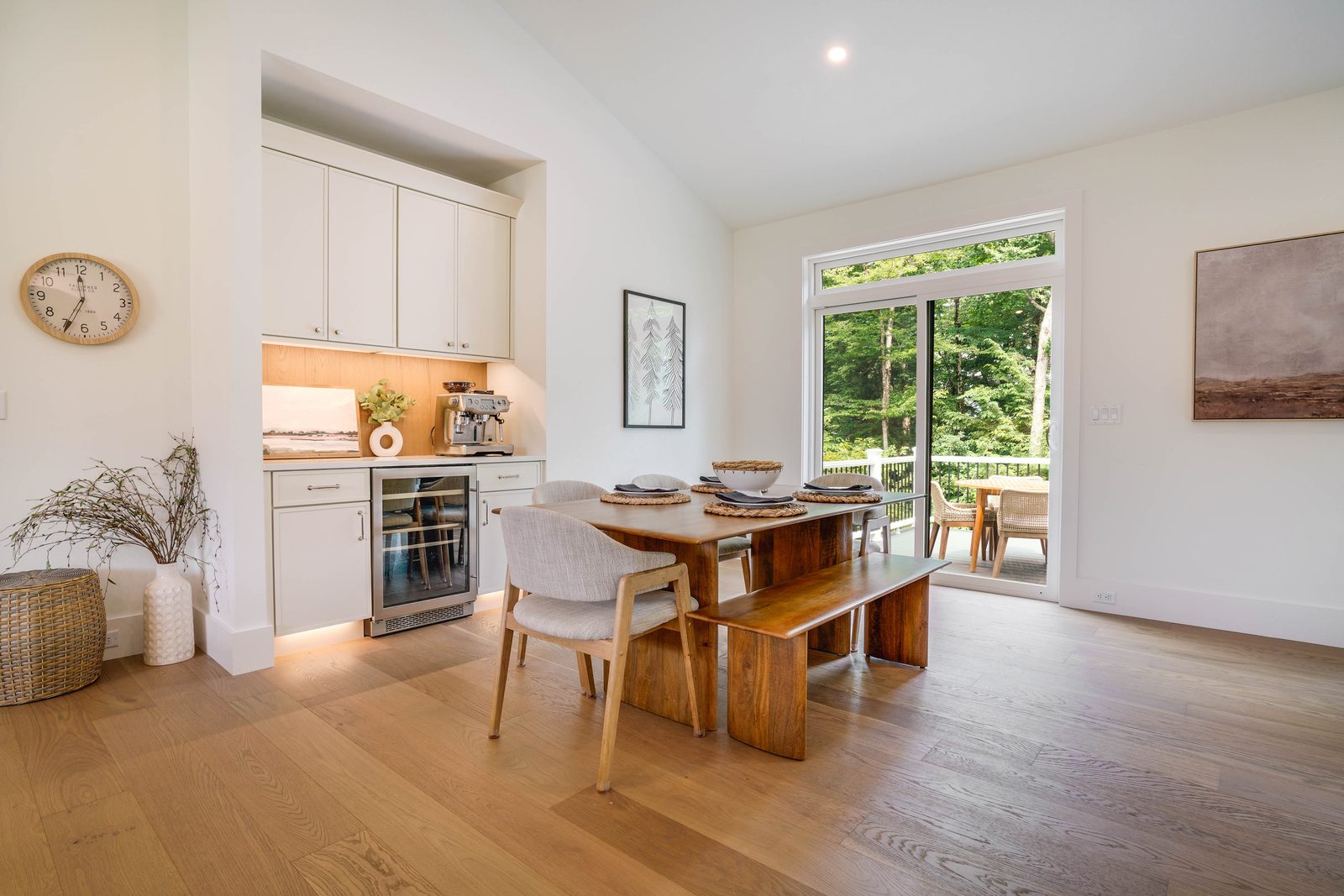Dining nook with bar cabinets and wine fridge