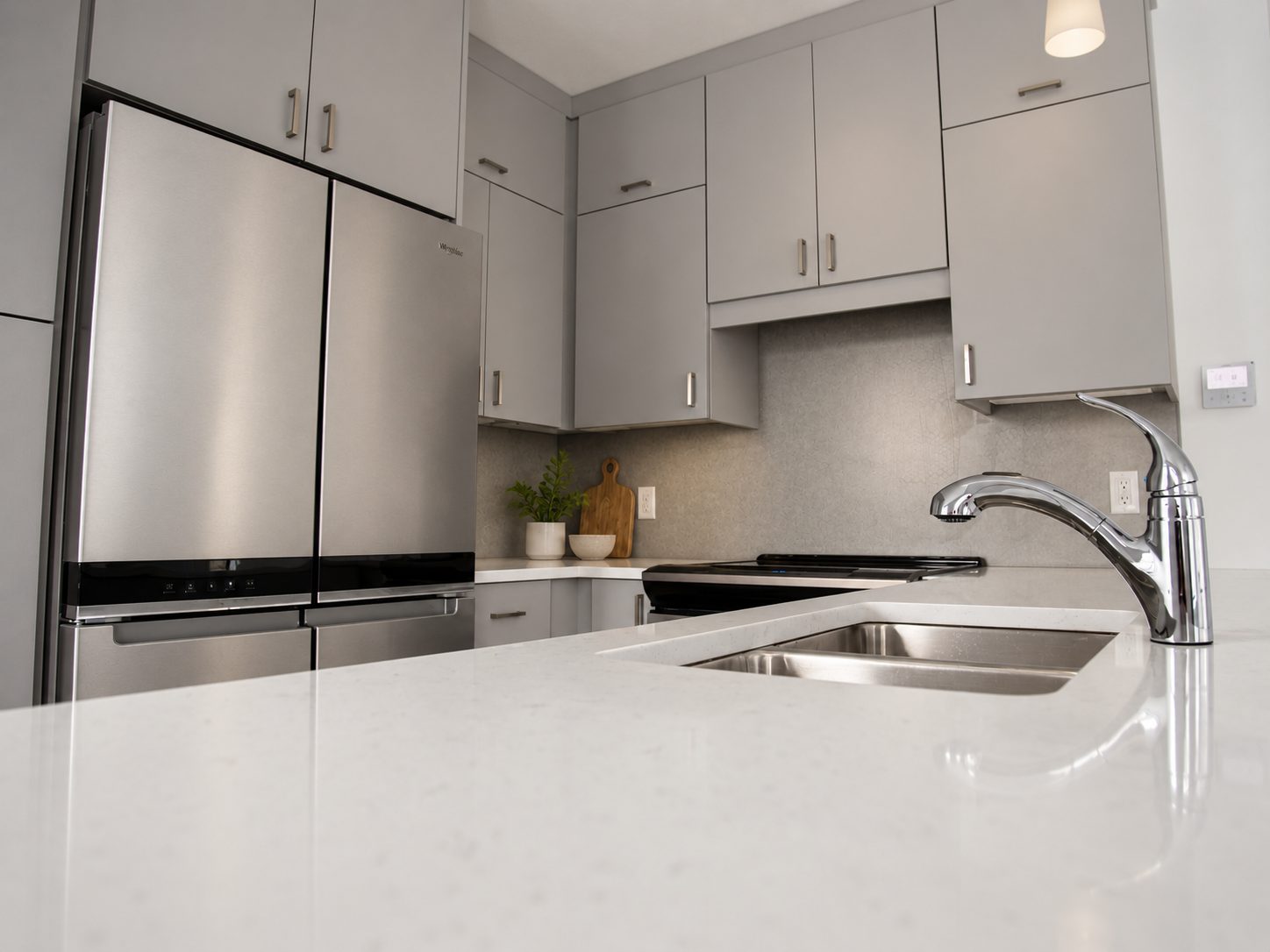 Stainless sink and faucet in the quartz island
