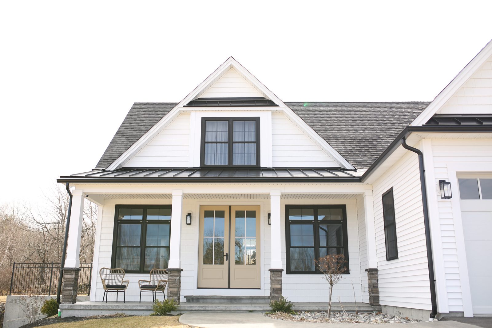 Modern farmhouse exterior with covered porch