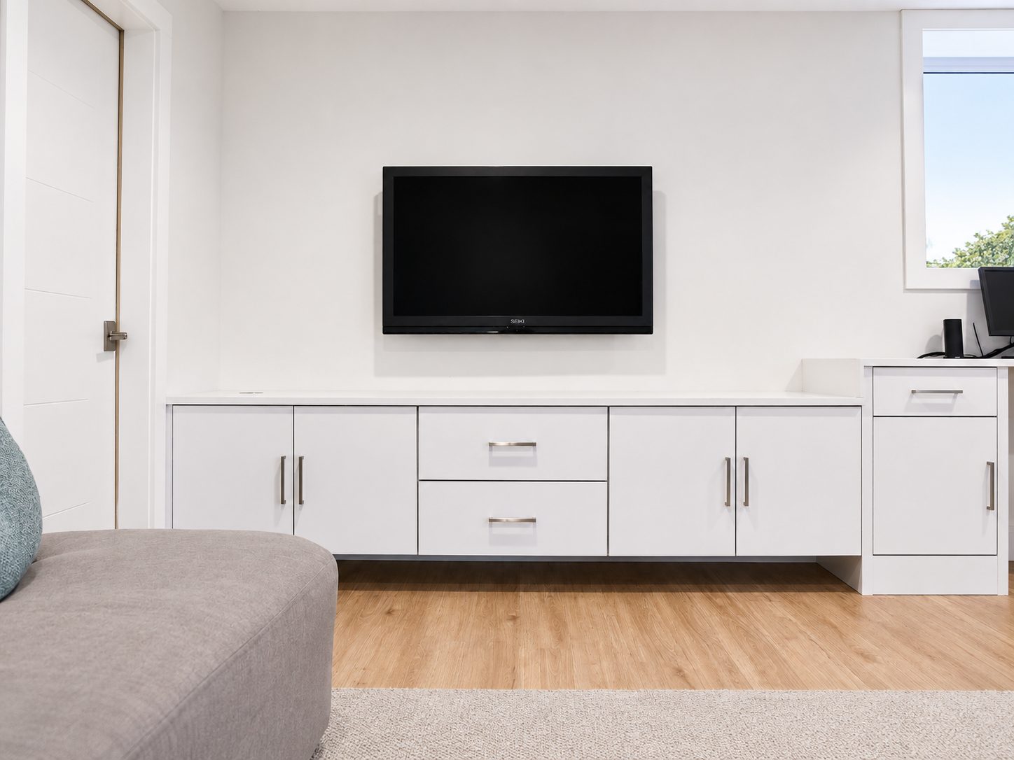 Flat-panel media wall built-in with mounted TV