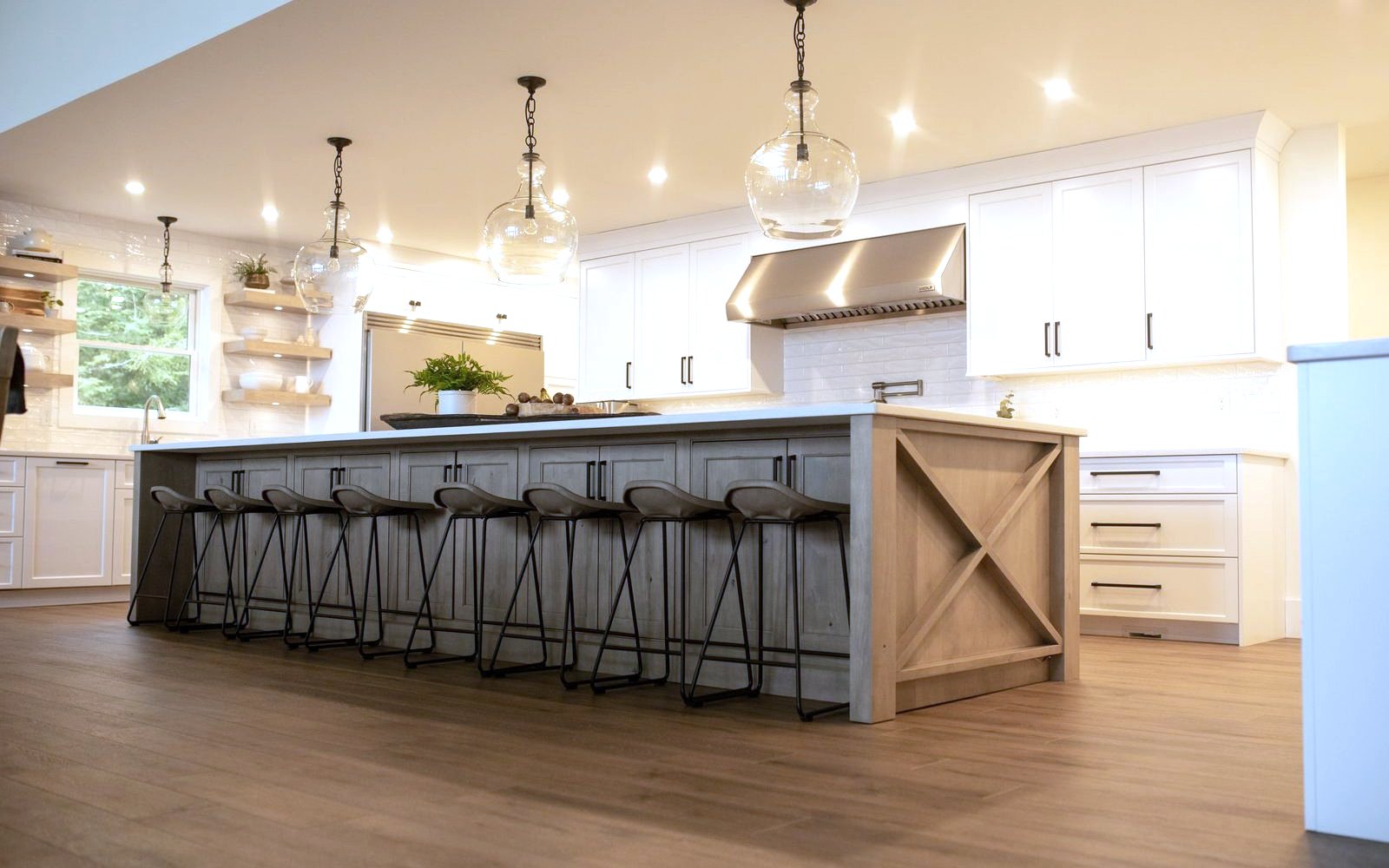 Whole-home Eclipse and Shiloh kitchen under shiplap vaults and timber beams, a Triumph lakeside build